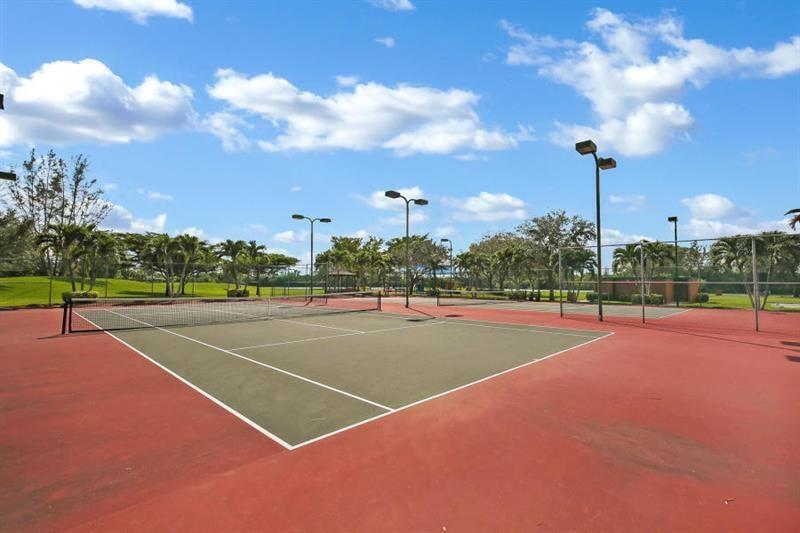 11750 Timbers Way Boca Raton, FL 33428 - Photo 24 of 25 a view of a tennis court