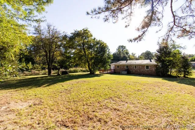 a house with trees in front of it