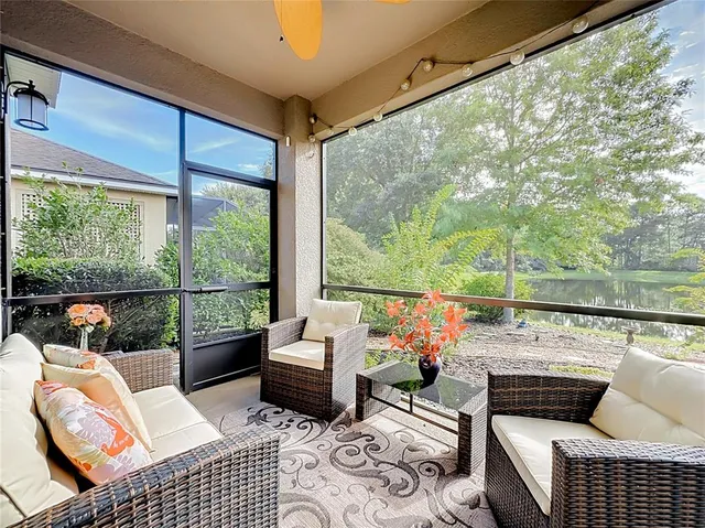 an aerial view of a house with garden space and a street view