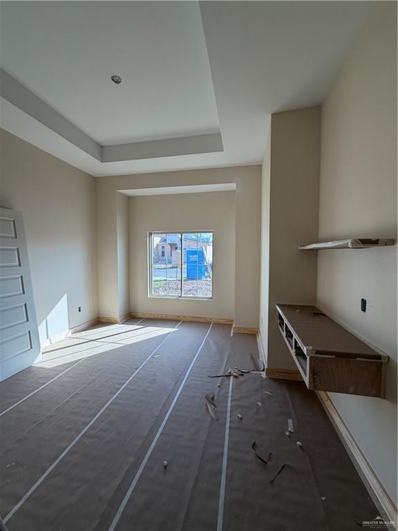 6107 West Street Edcouch, TX 78538 - Photo 11 of 27 a bedroom with a bed and a window