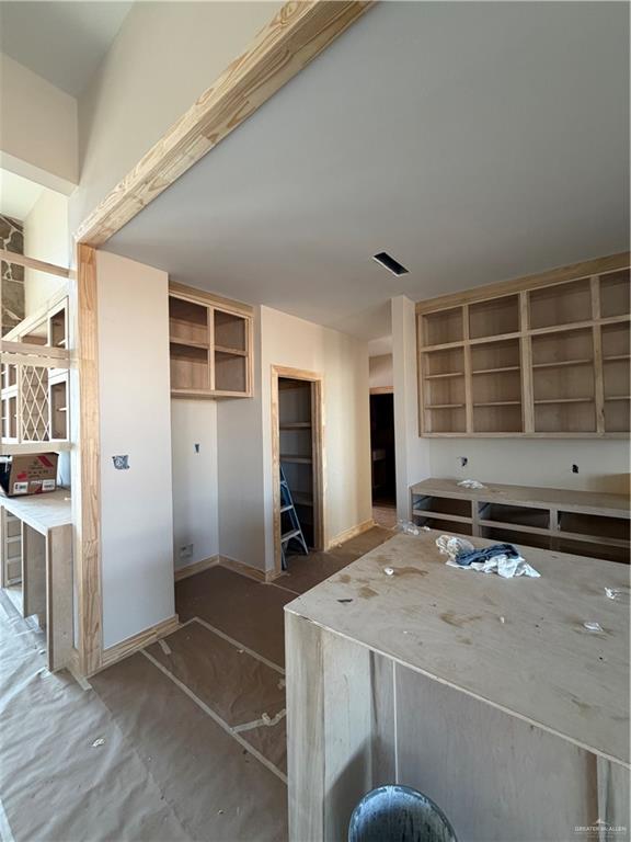 6107 West Street Edcouch, TX 78538 - Photo 24 of 27 a kitchen with kitchen island a sink a stove and a refrigerator