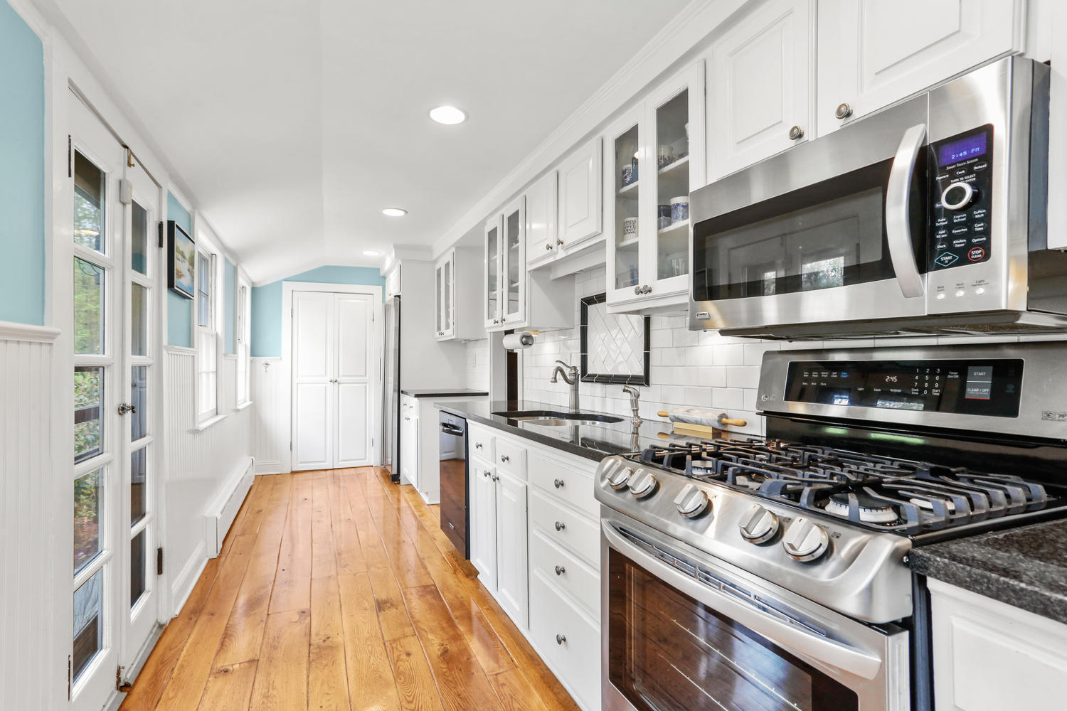 31 Jelliff Mill Road New Canaan, CT 06840 - Photo 11 of 51 a kitchen with stainless steel appliances granite countertop a stove and a sink