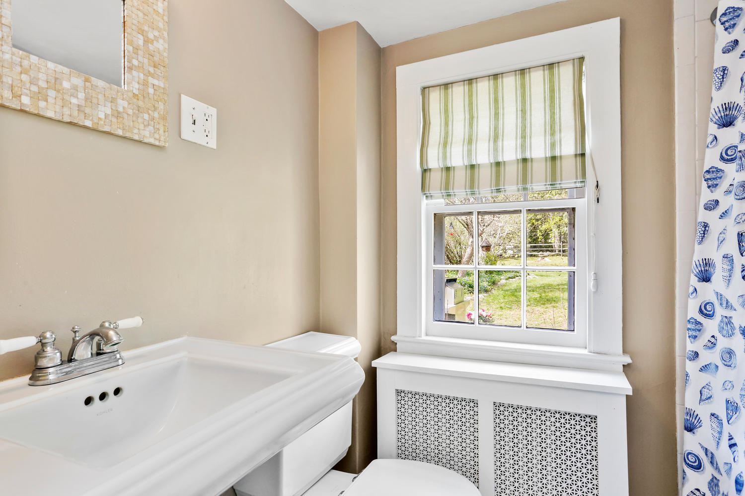 31 Jelliff Mill Road New Canaan, CT 06840 - Photo 19 of 51 a bathroom with a sink and a bathtub