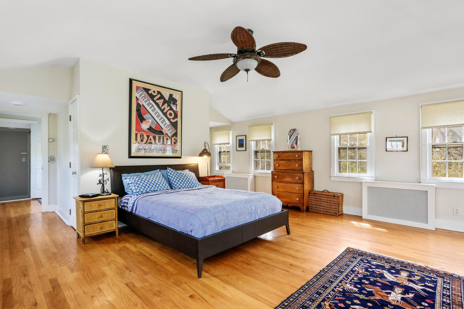 31 Jelliff Mill Road New Canaan, CT 06840 - Photo 21 of 51 a bedroom with a bed and wooden floor