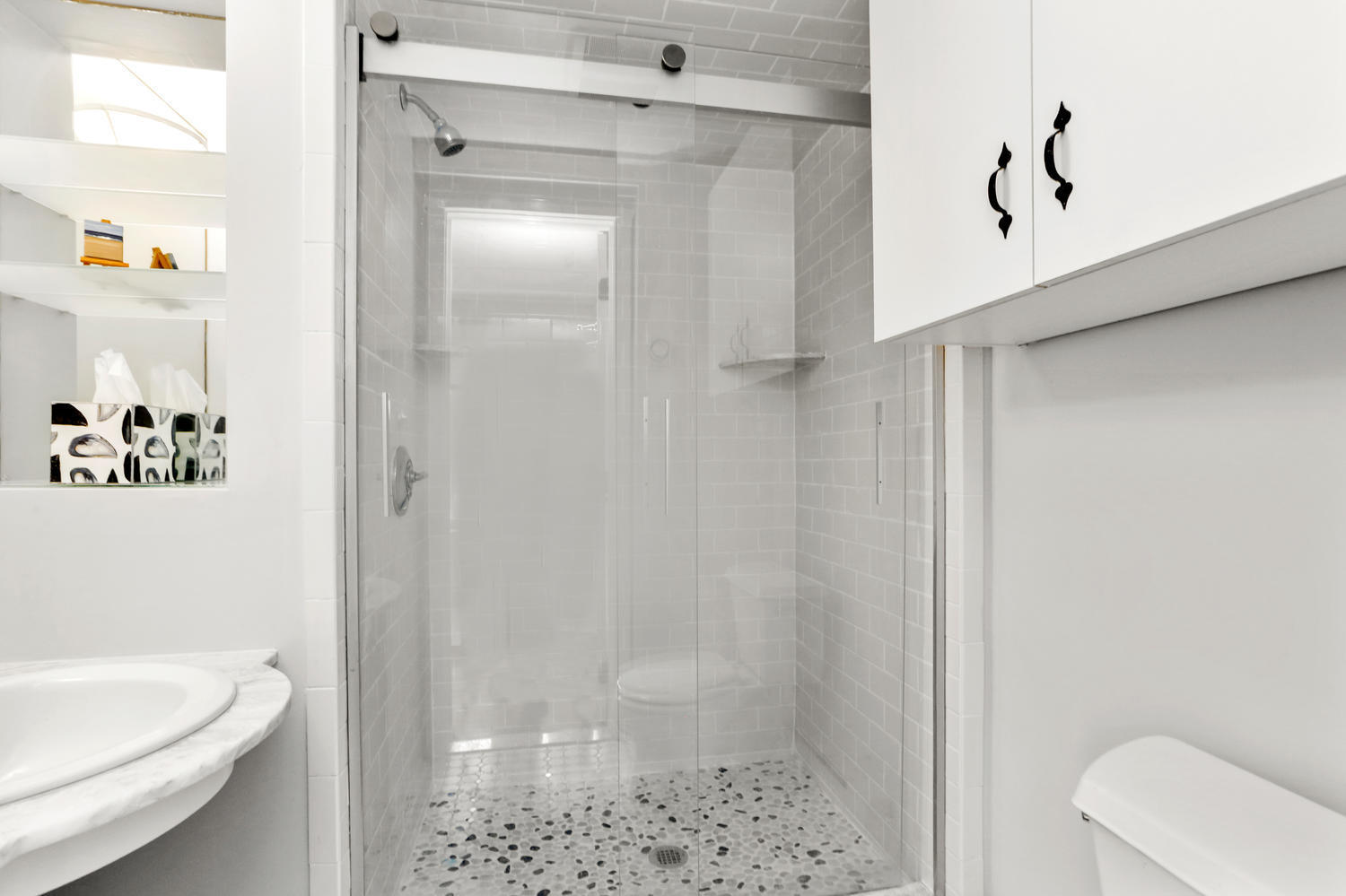 31 Jelliff Mill Road New Canaan, CT 06840 - Photo 23 of 51 a bathroom with a shower and a toilet