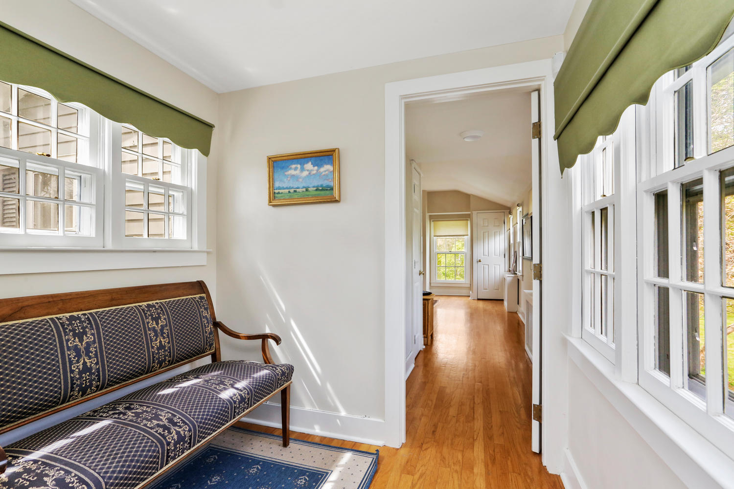 31 Jelliff Mill Road New Canaan, CT 06840 - Photo 24 of 51 a view of a hallway with wooden floor and windows