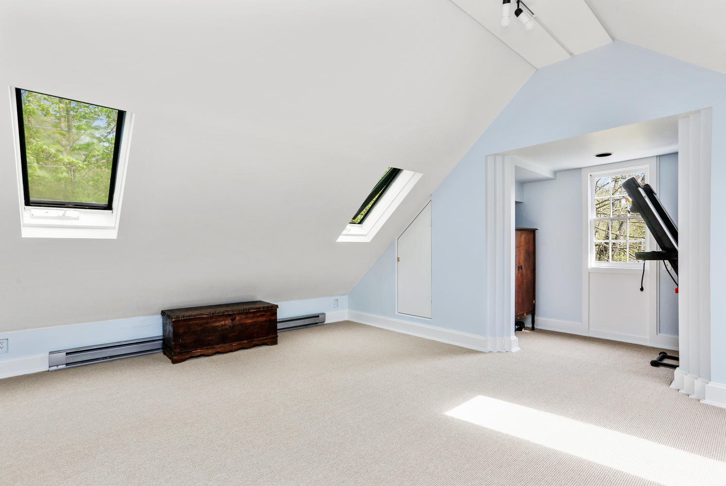 31 Jelliff Mill Road New Canaan, CT 06840 - Photo 32 of 51 a view of a livingroom with wooden floor and stairs
