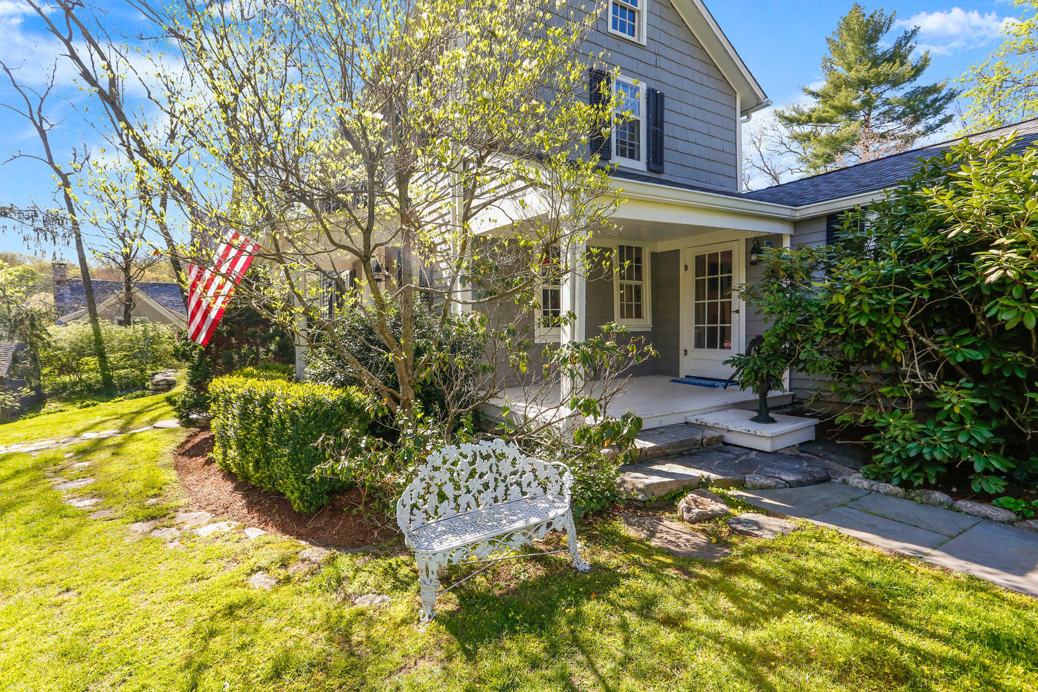 31 Jelliff Mill Road New Canaan, CT 06840 - Photo 4 of 51 a view of a house with a yard and garden
