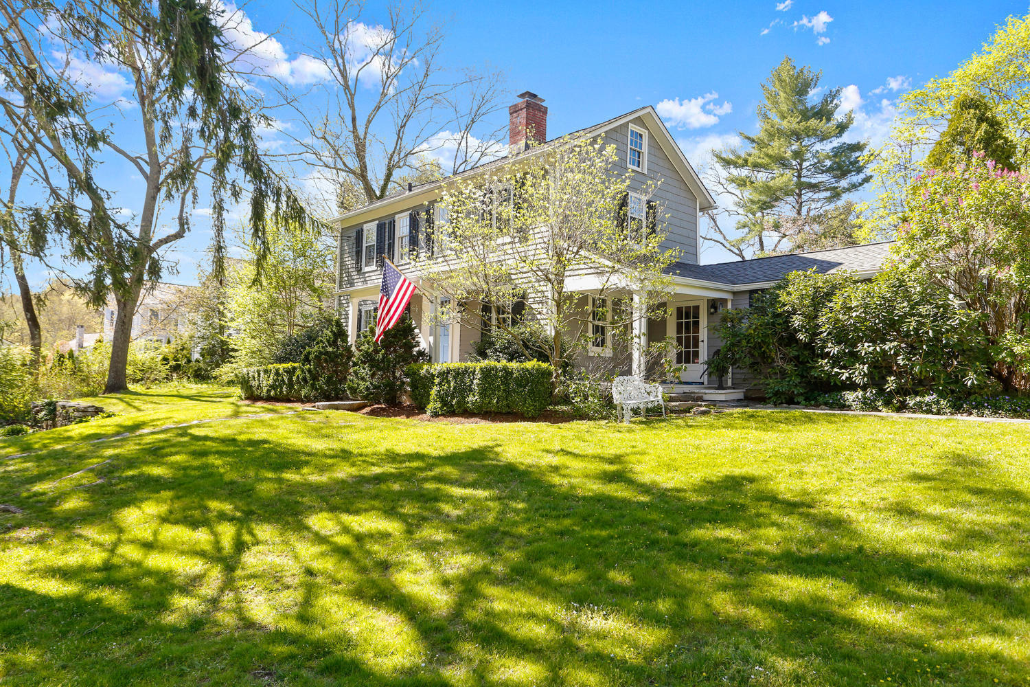 31 Jelliff Mill Road New Canaan, CT 06840 - Photo 42 of 51 a view of a house with a yard and sitting area