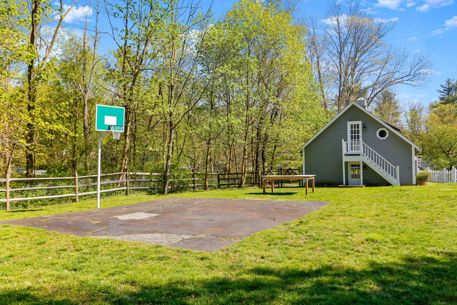 31 Jelliff Mill Road New Canaan, CT 06840 - Photo 46 of 51 a view of a house with a yard and sitting area