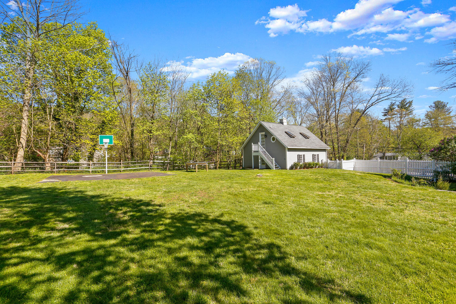 31 Jelliff Mill Road New Canaan, CT 06840 - Photo 48 of 51 a view of swimming pool with an outdoor space and seating area