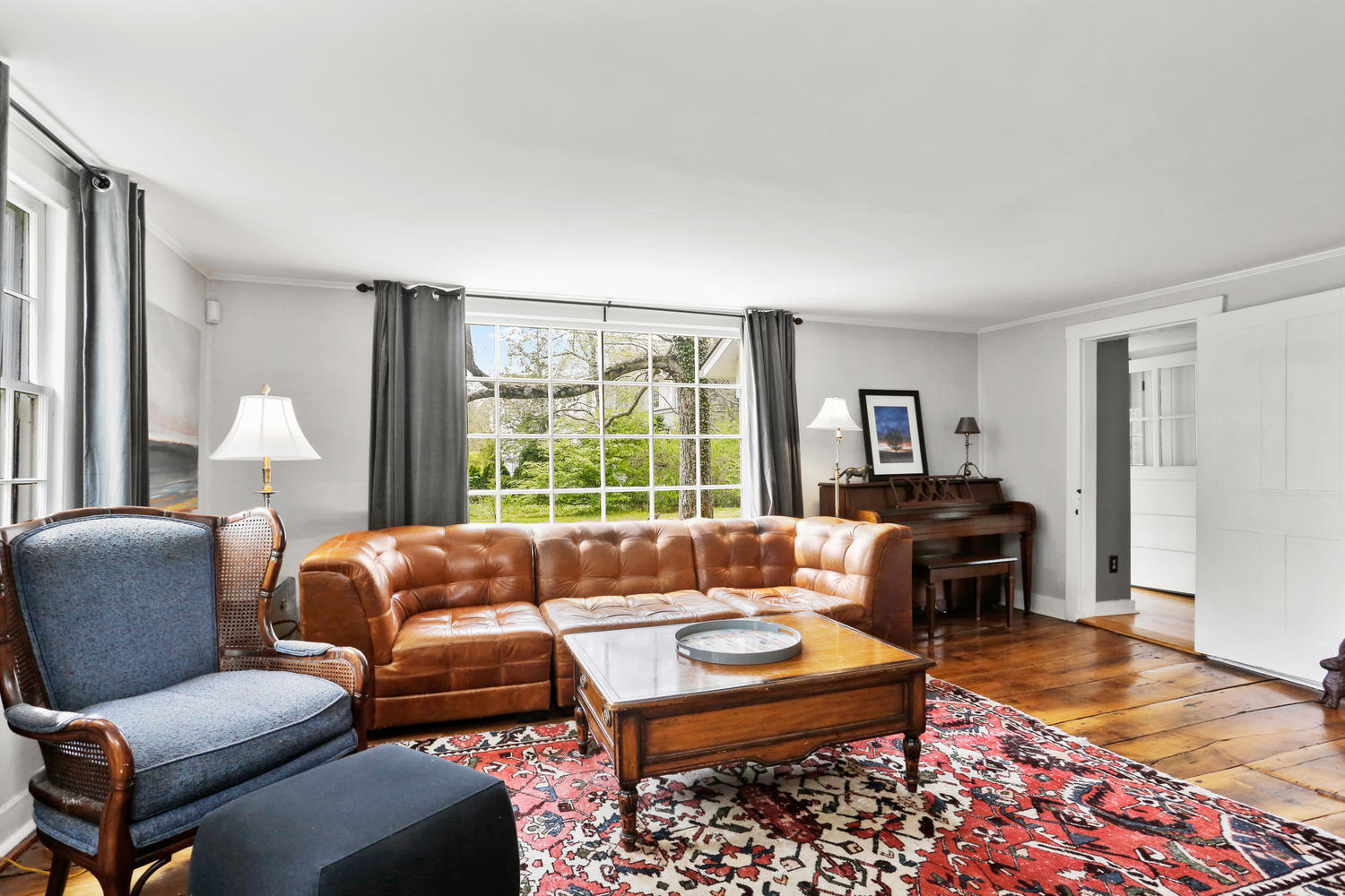 31 Jelliff Mill Road New Canaan, CT 06840 - Photo 6 of 51 a living room with furniture a rug and a large window
