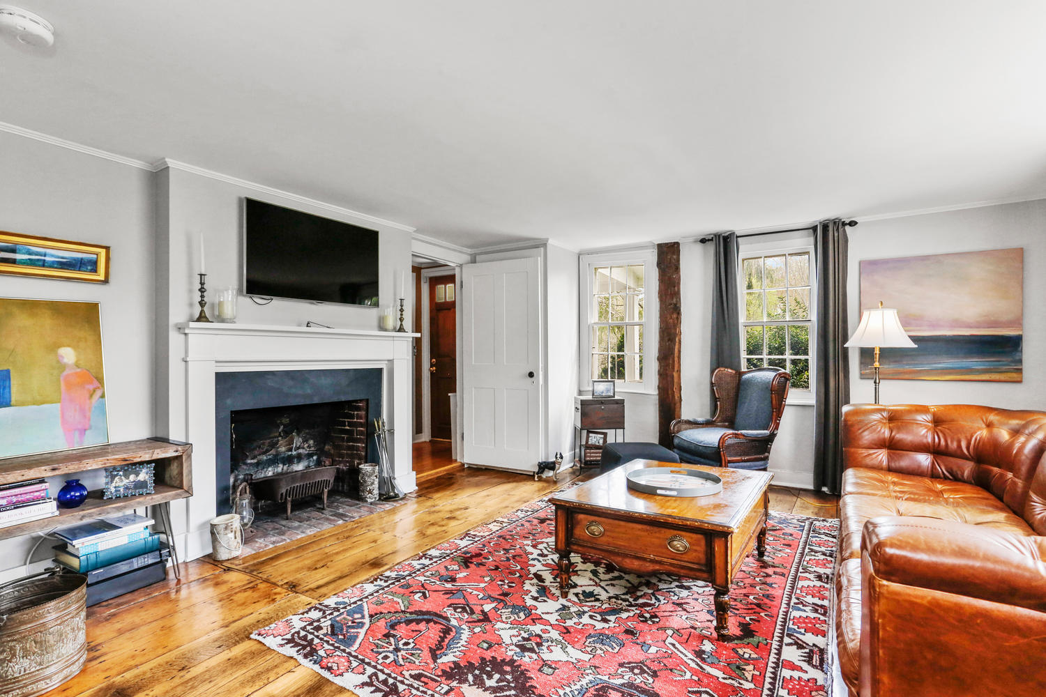 31 Jelliff Mill Road New Canaan, CT 06840 - Photo 7 of 51 a living room with furniture and a fireplace