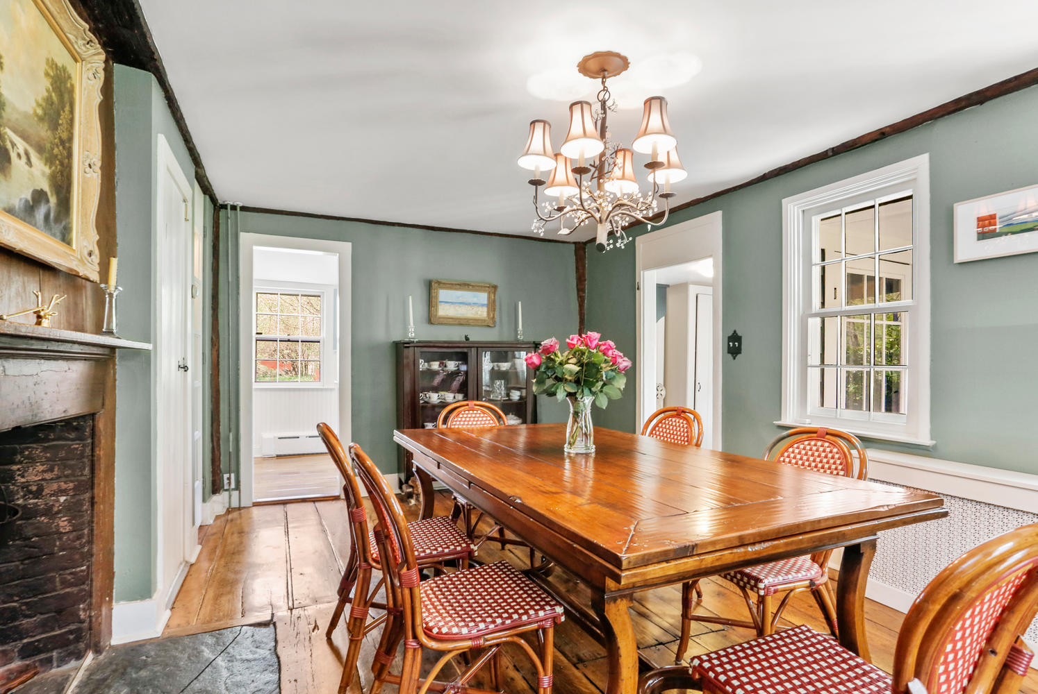 31 Jelliff Mill Road New Canaan, CT 06840 - Photo 8 of 51 a dining room with furniture a chandelier and wooden floor