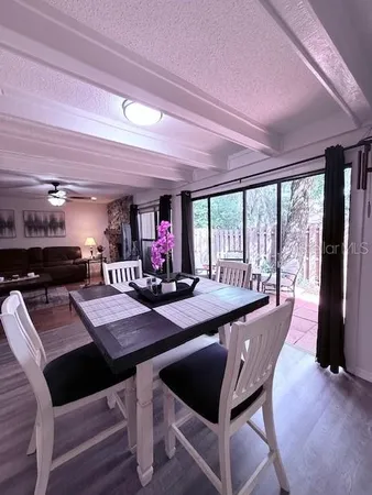 a kitchen with a refrigerator stove and microwave