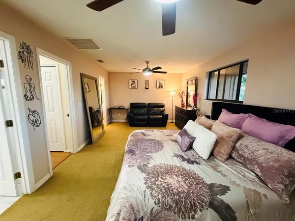 a picture of a bench in front of a wall