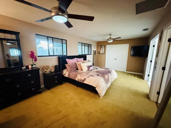 a living room with a couch and a flat screen tv