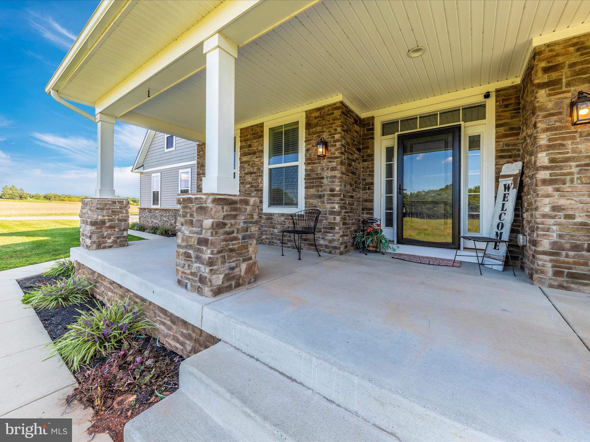 14671 Sugarland Road Poolesville, MD 20837 - Photo 3 of 62 a view of a house with outdoor space