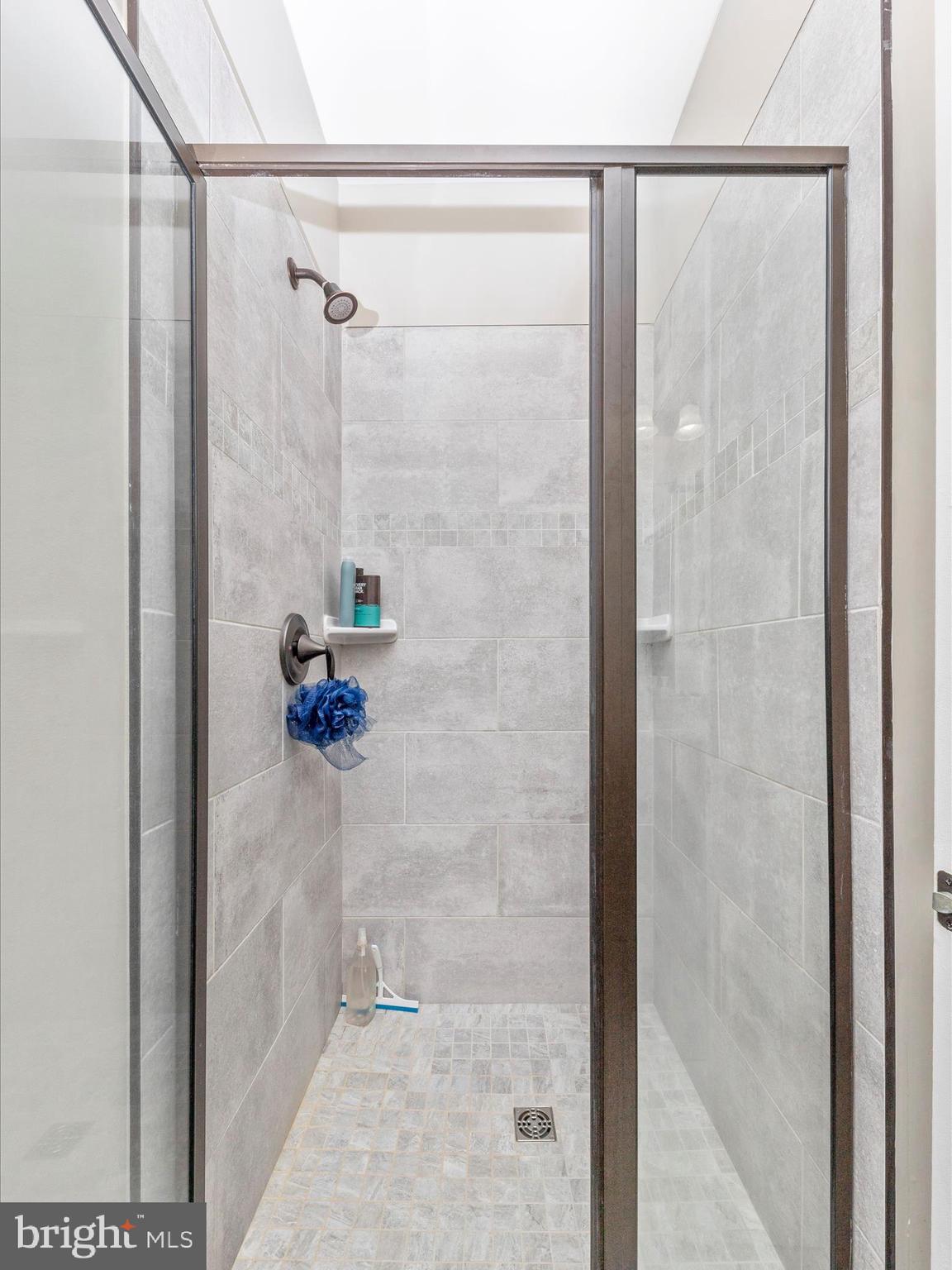 14671 Sugarland Road Poolesville, MD 20837 - Photo 34 of 62 a bathroom with a shower