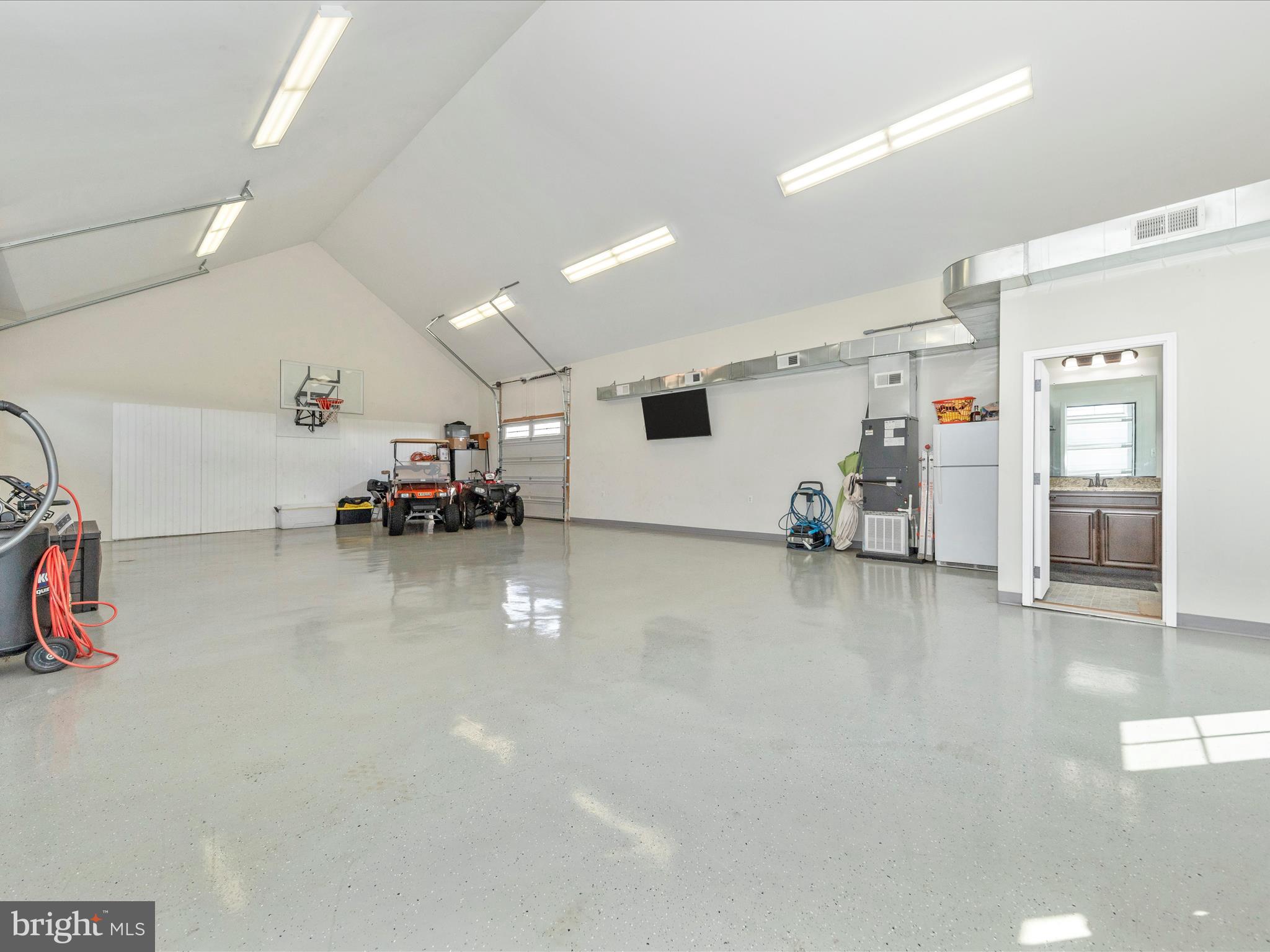 14671 Sugarland Road Poolesville, MD 20837 - Photo 44 of 62 a view of a studio with seating area