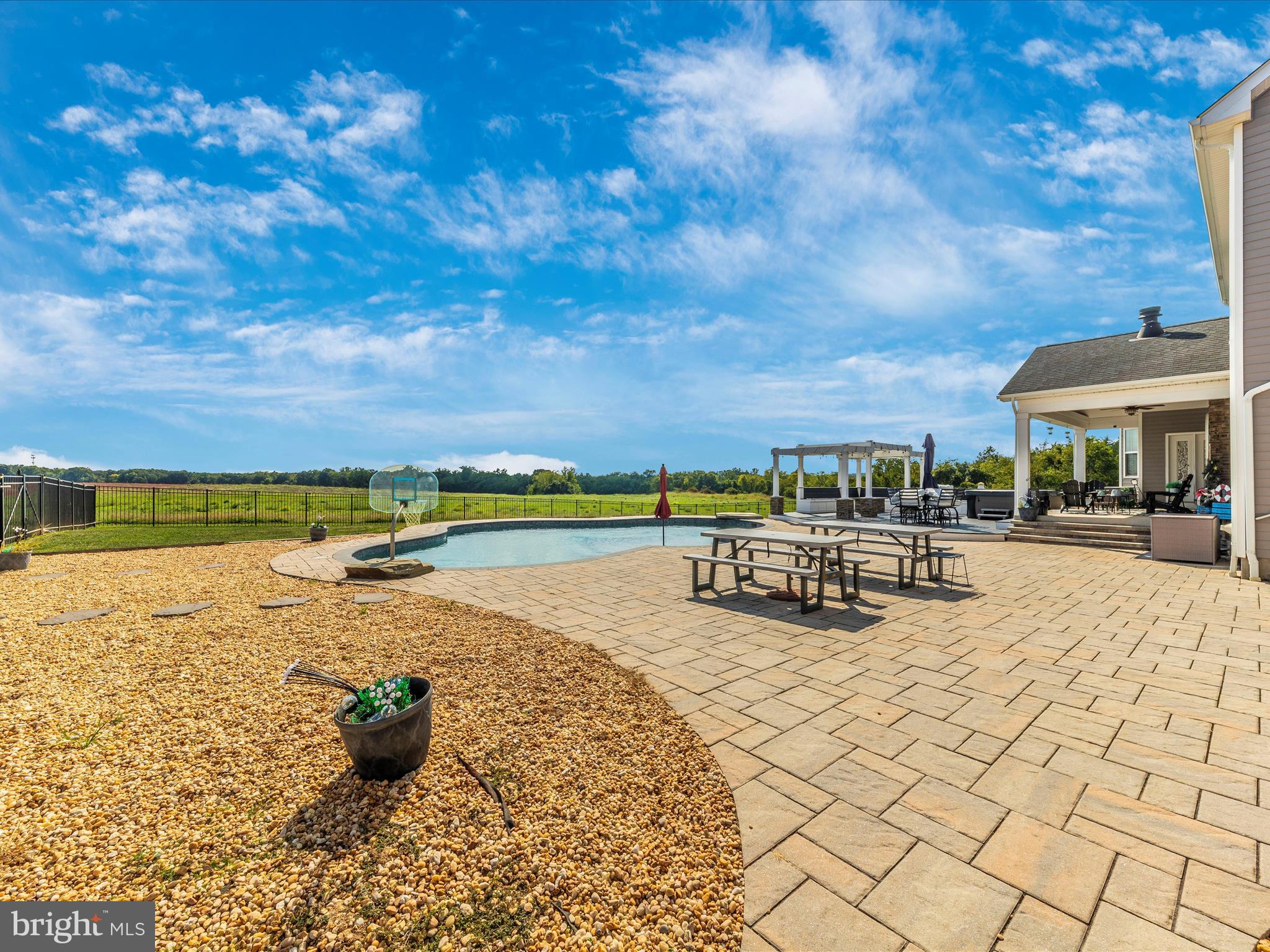 14671 Sugarland Road Poolesville, MD 20837 - Photo 55 of 62 a view of swimming pool with outdoor seating and a yard