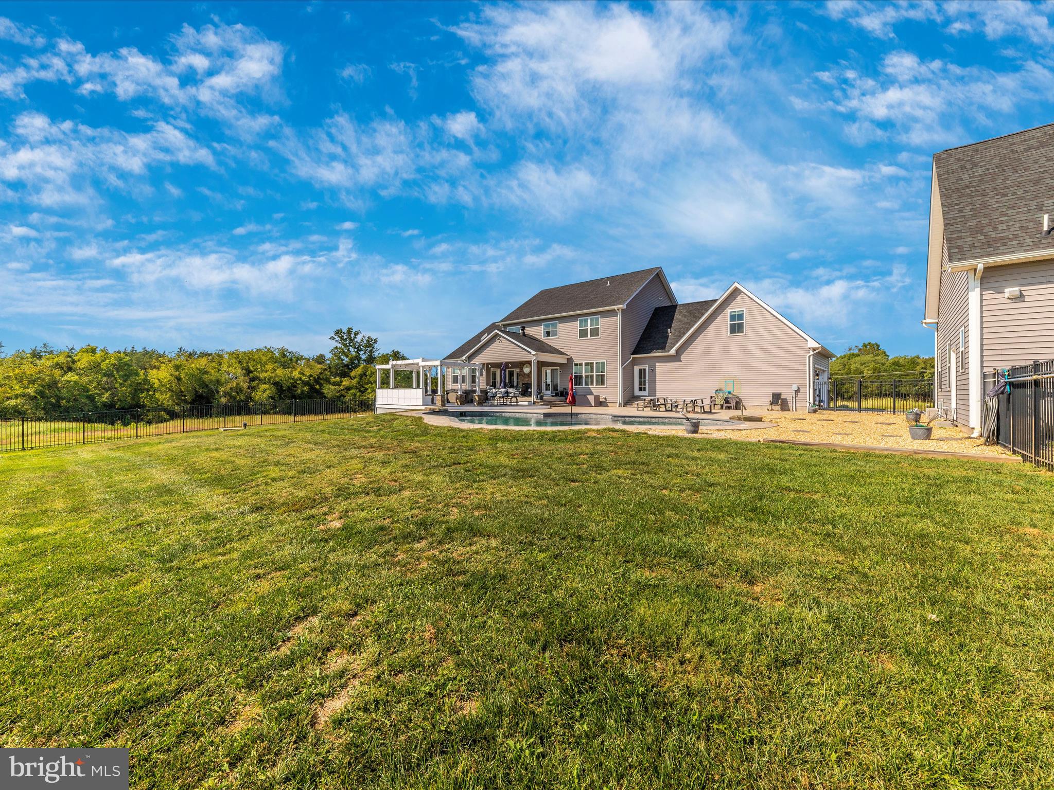 14671 Sugarland Road Poolesville, MD 20837 - Photo 57 of 62 a view of a house with a yard