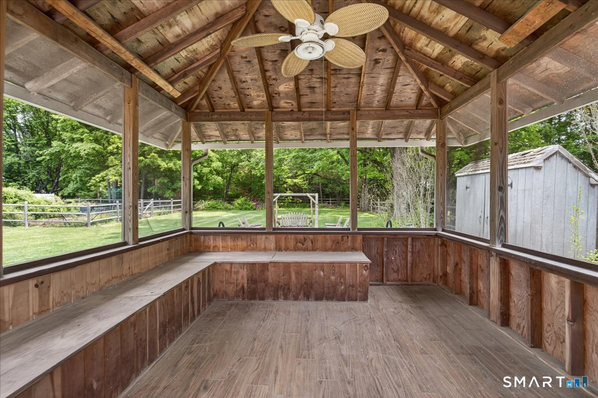 1006 King Road Cheshire, CT 06410 - Photo 34 of 40 The screened gazebo also has storage benches and ceiling fan.