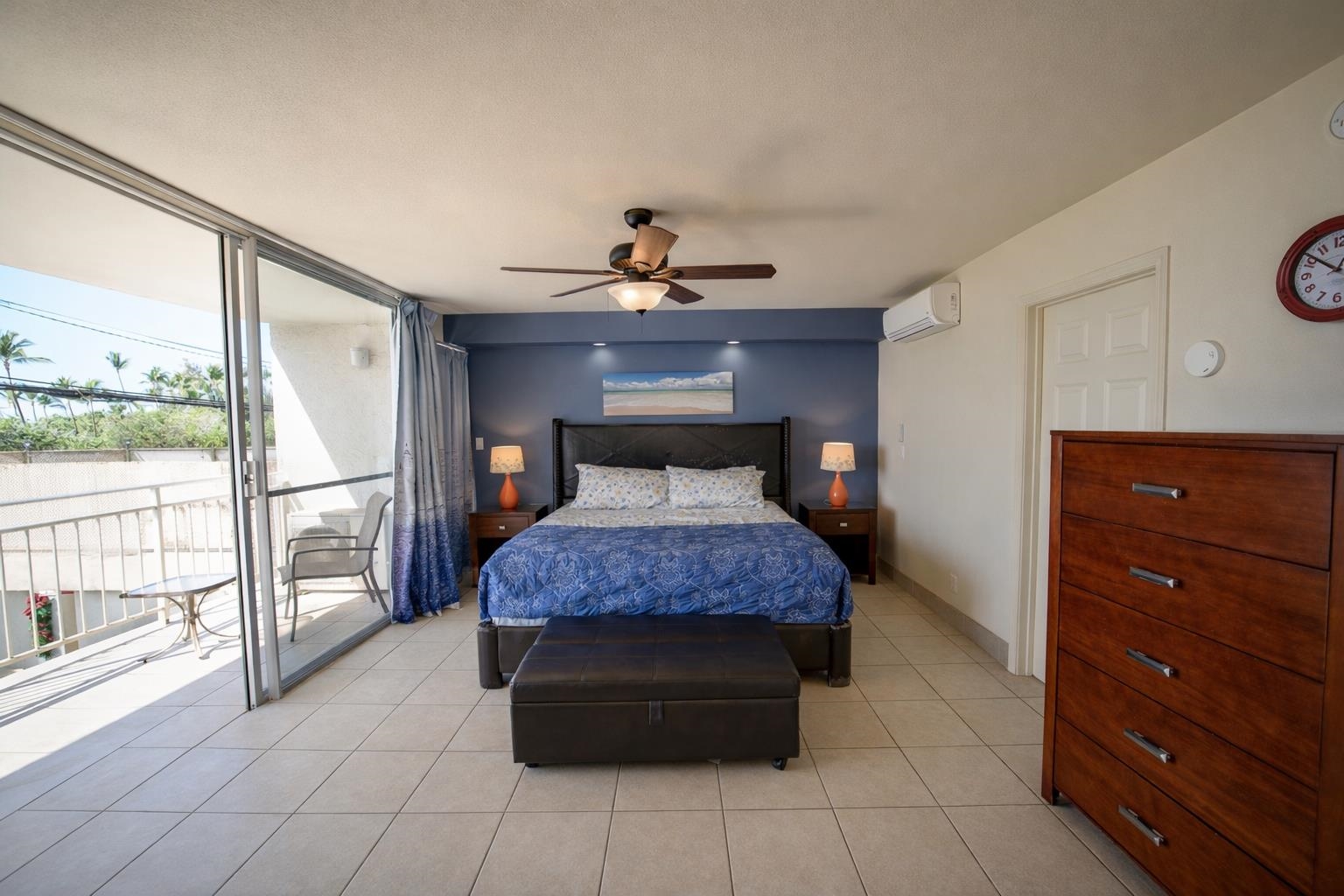 1993 South Kihei Road, Unit 201 Kihei, HI 96753 - Photo 4 of 11 a bedroom with a bed and a window
