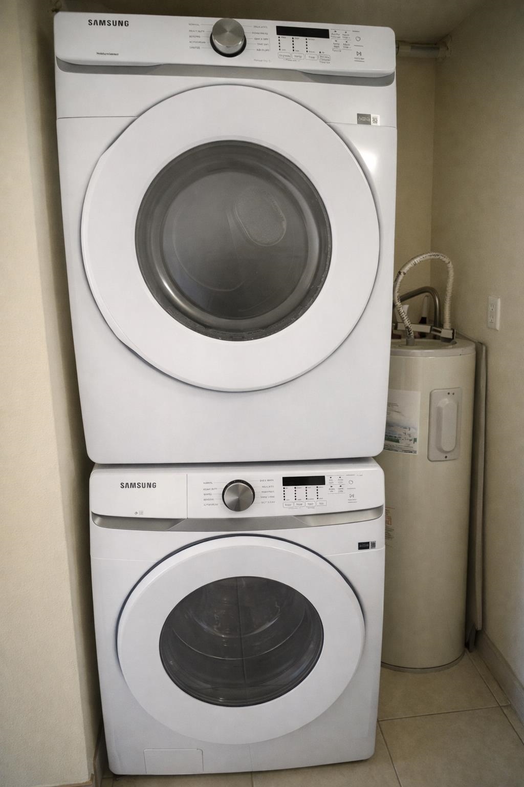 1993 South Kihei Road, Unit 201 Kihei, HI 96753 - Photo 10 of 11 a utility room with dryer and washer