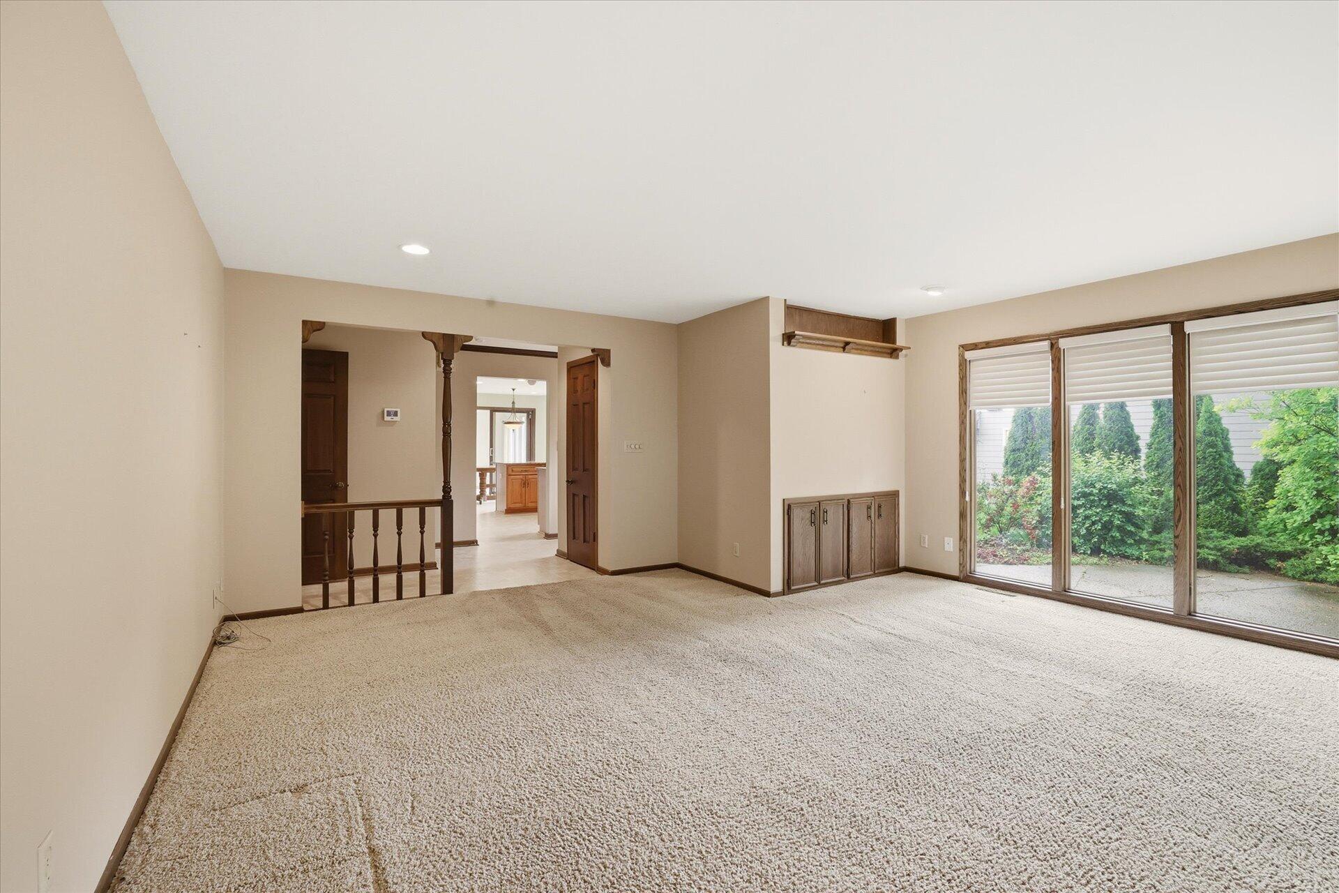 4100 South 119th Street Greenfield, WI 53228 - Photo 31 of 31 View from fireplace to kitchen