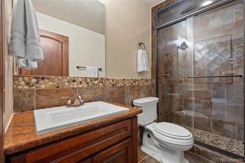 an aerial view of houses with yard