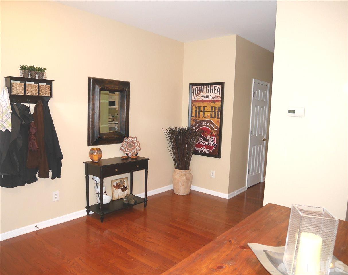 4827 Black Mountain Path Raleigh, NC 27612 - Photo 5 of 19 a living room with furniture and a flat screen tv