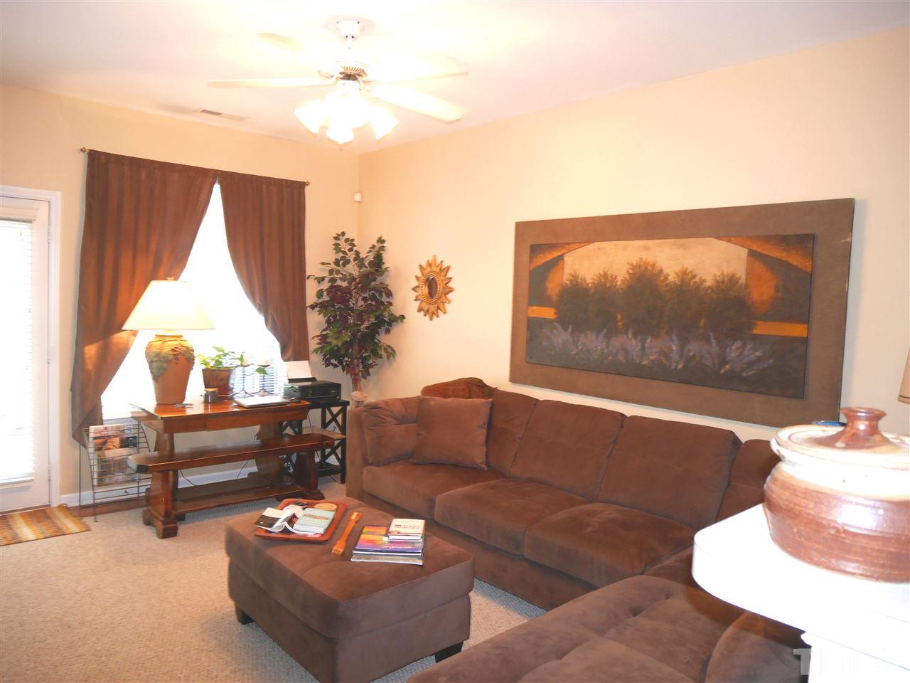 4827 Black Mountain Path Raleigh, NC 27612 - Photo 9 of 19 a living room with furniture and a large window