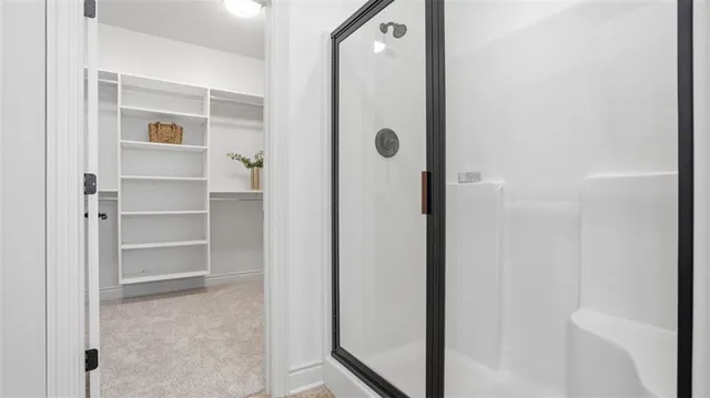 a view of a bathroom from a hallway