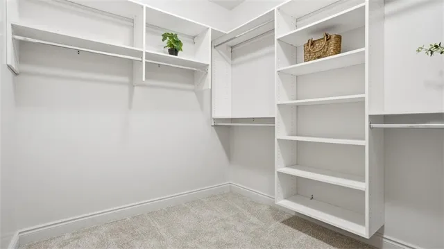 a view of an empty walk in closet
