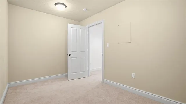 an empty room with an entryway