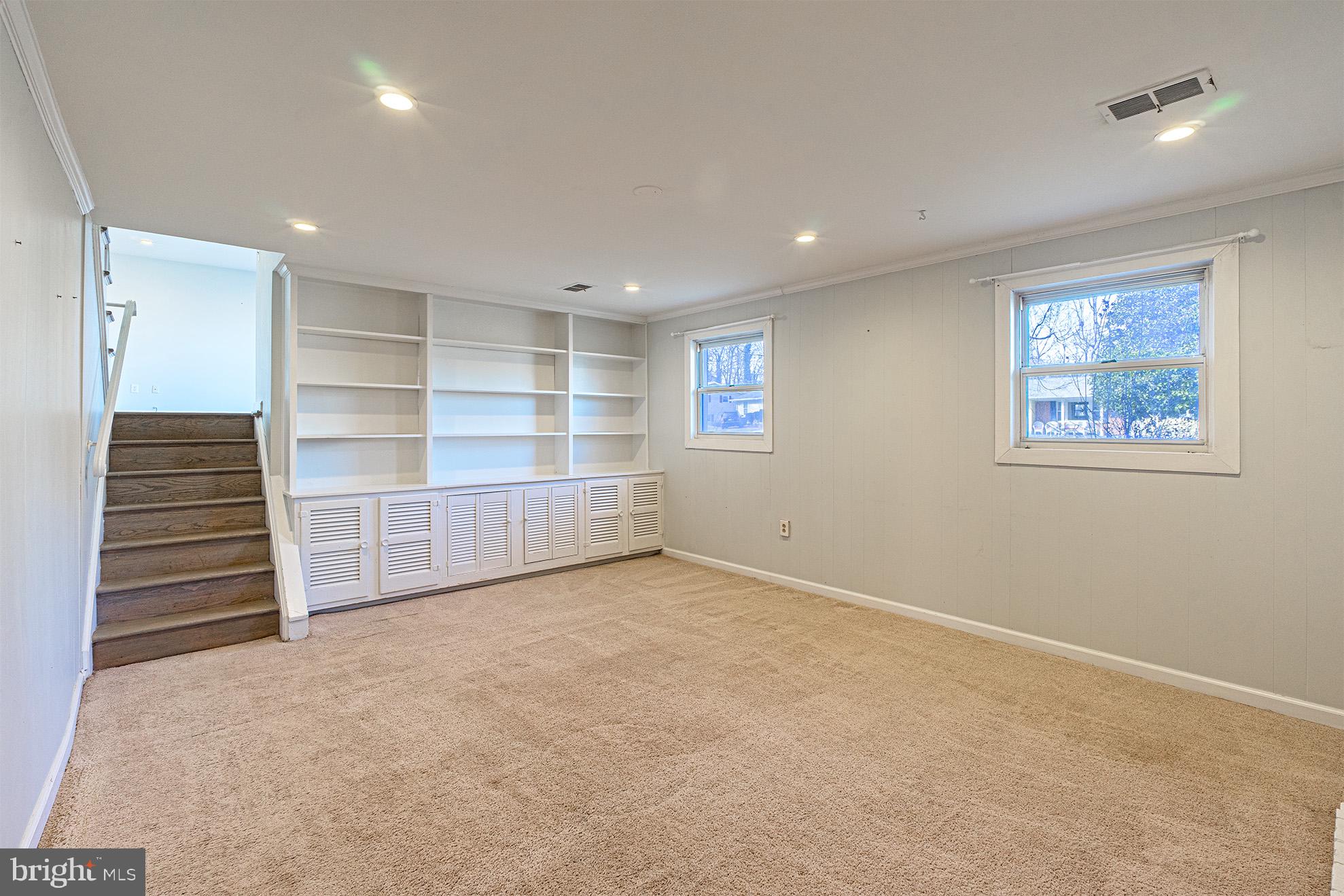 8207 Old Oaks Drive Springfield, VA 22152 - Photo 12 of 19 an empty room with a hallway and closet