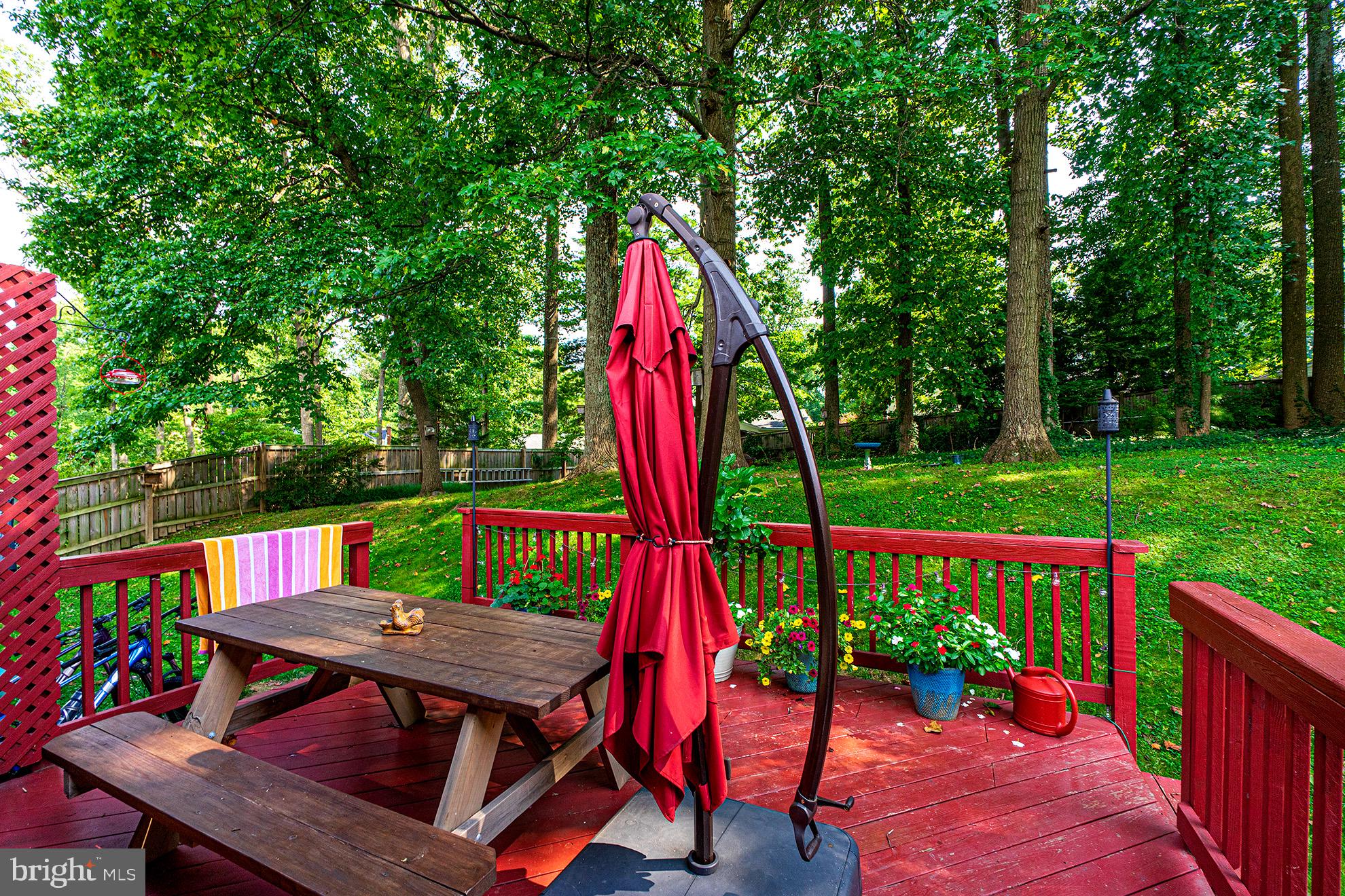 8207 Old Oaks Drive Springfield, VA 22152 - Photo 14 of 19 a view of a sitting area with furniture and wooden deck