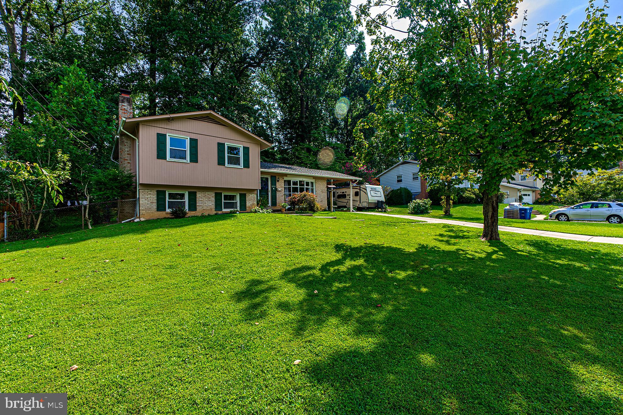 8207 Old Oaks Drive Springfield, VA 22152 - Photo 2 of 19 a house view with a garden space