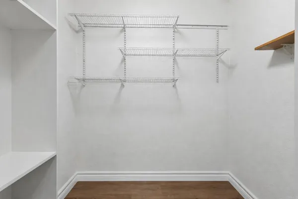 a view of a room with racks on the wall