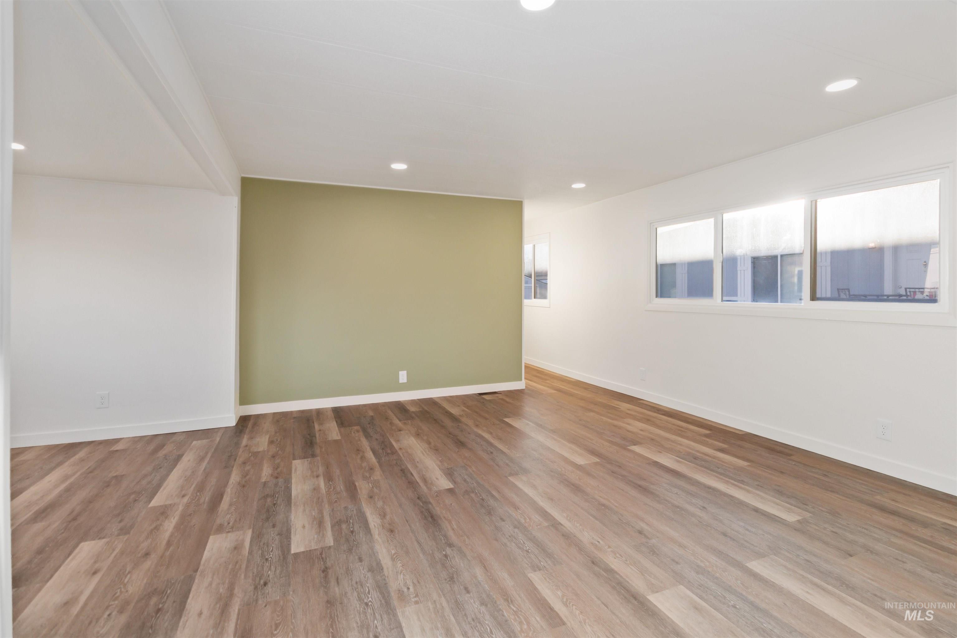 618 Empress Street Boise, ID 83713 - Photo 6 of 27 Unfurnished room with recessed lighting and light wood finished floors