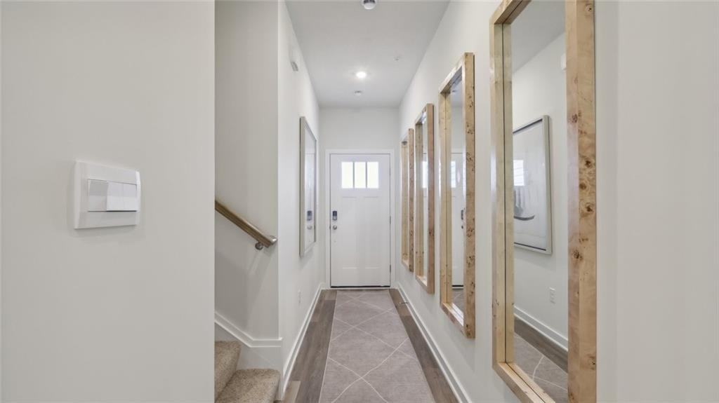 160 River Rdg Drive Moon Township, PA 15108 - Photo 3 of 18 a view of a hallway with wooden floor and entryway