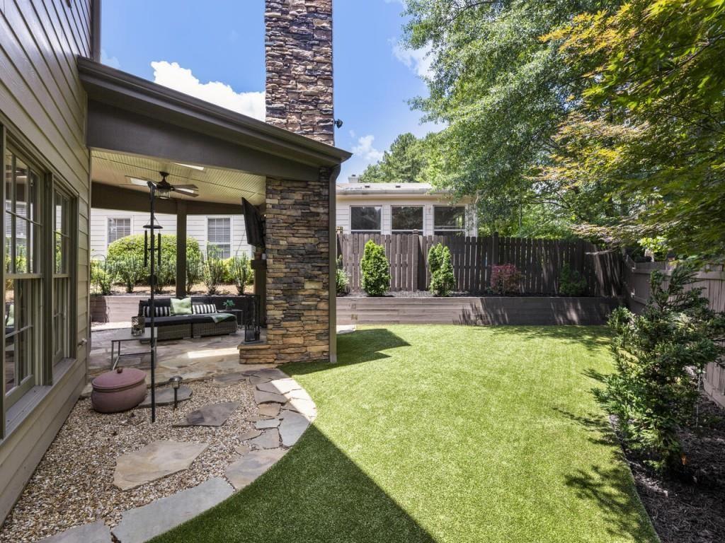 315 Landing Entry Alpharetta, GA 30022 - Photo 3 of 17 a view of a backyard with a patio