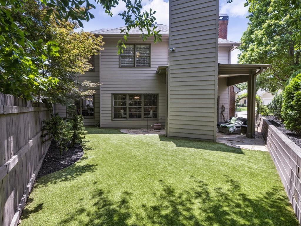 315 Landing Entry Alpharetta, GA 30022 - Photo 4 of 17 a view of a house with a yard and potted plants