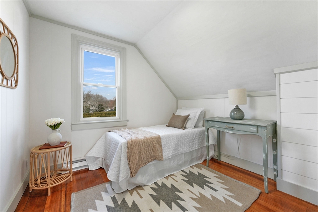 32 Cedar Street Fairhaven, MA 02719 - Photo 19 of 28 a bedroom with a bed and a window