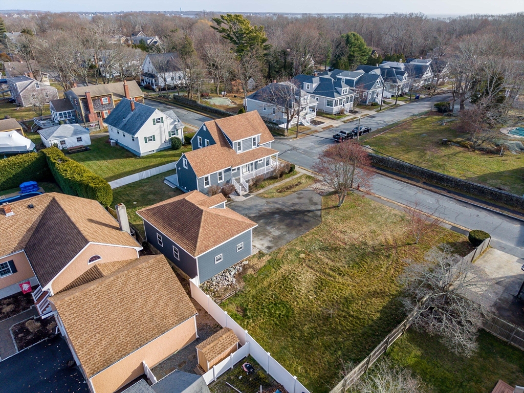 32 Cedar Street Fairhaven, MA 02719 - Photo 26 of 28 an aerial view of a house with swimming pool and ocean view