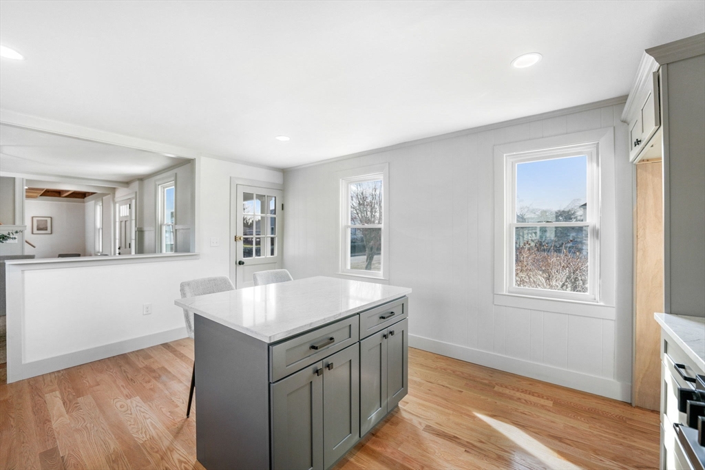 32 Cedar Street Fairhaven, MA 02719 - Photo 6 of 28 a kitchen with a sink stove and cabinets