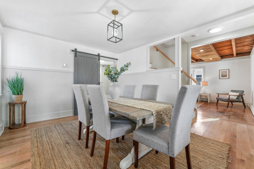 32 Cedar Street Fairhaven, MA 02719 - Photo 10 of 28 a view of a dining room with furniture and wooden floor