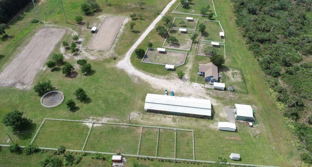 1817 Jones Road Melbourne, FL 32934 - Photo 1 of 38 an aerial view of a residential houses with outdoor space