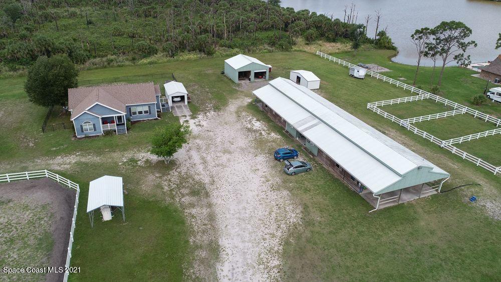 1817 Jones Road Melbourne, FL 32934 - Photo 3 of 38 an aerial view of a house
